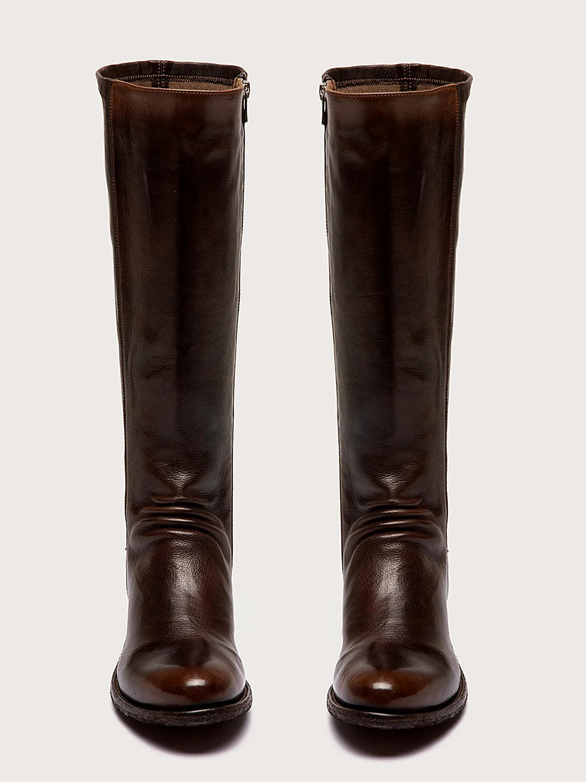 Brown stretch back pair arranged together on a neutral ground
