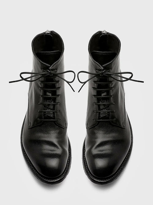 Black rear zip pair arranged together on a neutral ground