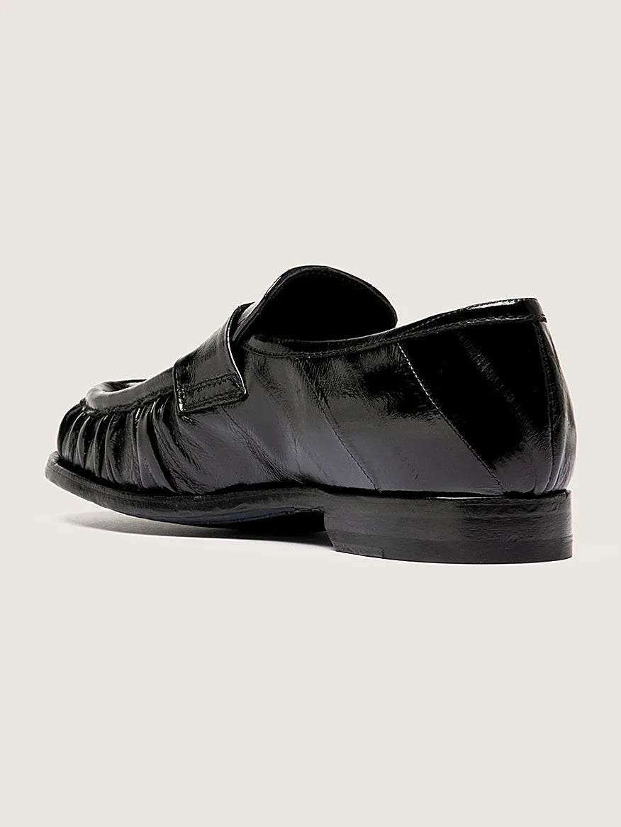 Black hybrid sole seen at an angle showing the toe