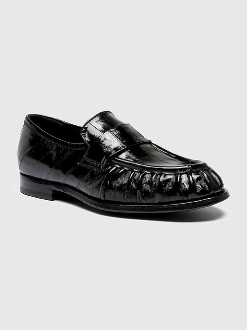 Black hybrid sole shown from the side on a plain background