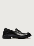 Black almond toe close view of the heel and sole edge