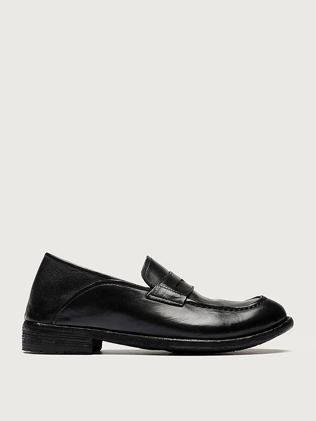 Black almond toe close view of the heel and sole edge