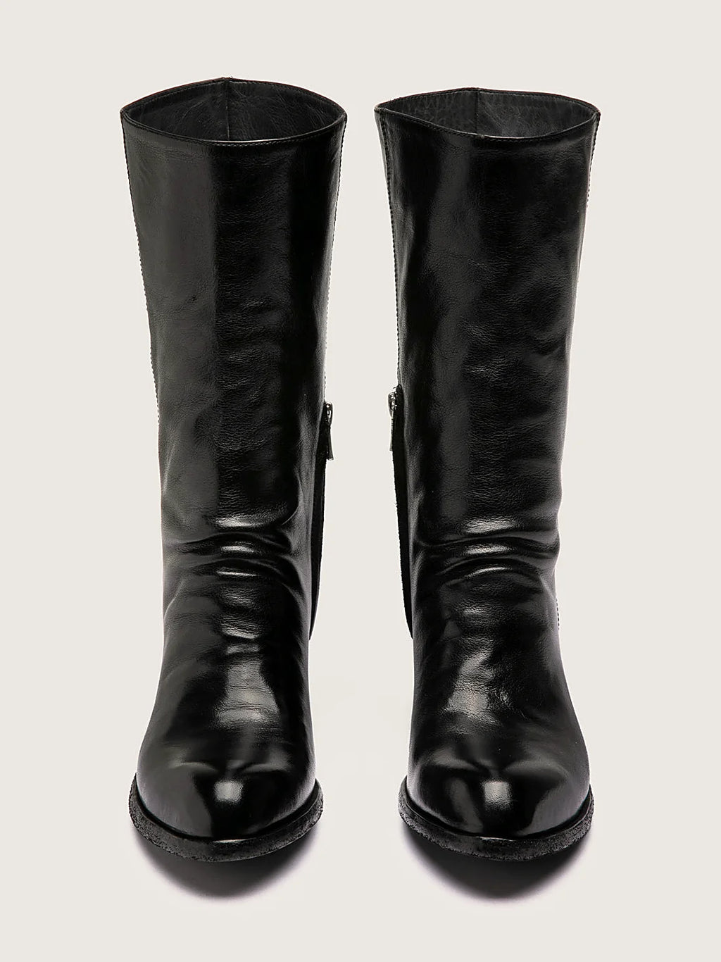 Black stacked heel viewed from above showing the opening