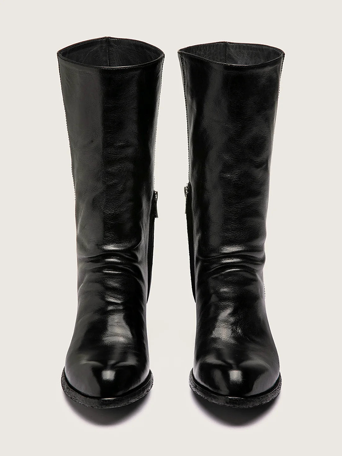 Black stacked heel viewed from above showing the opening