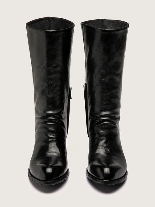 Black stacked heel viewed from above showing the opening