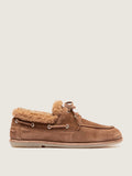 Brown shoes leather-laced close view of the heel and sole edge