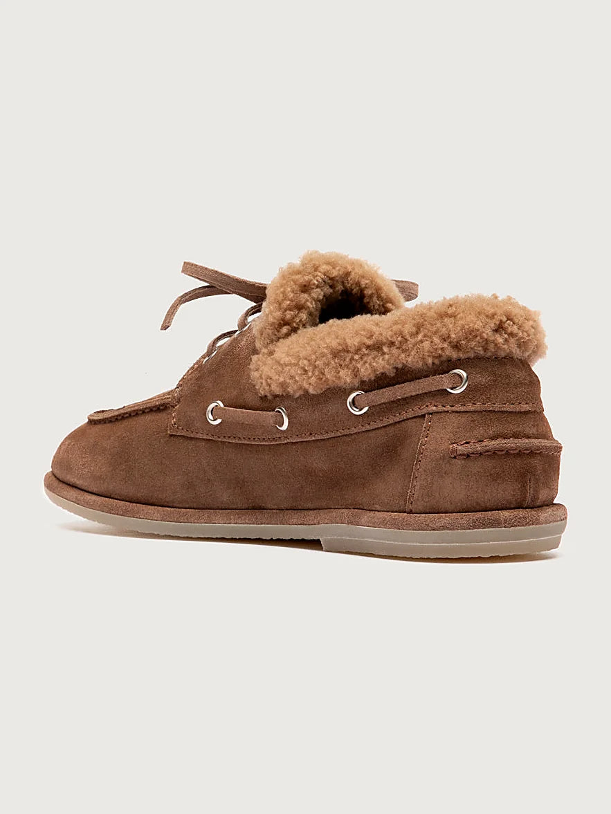 Brown shoes leather-laced detail of the stitching and upper