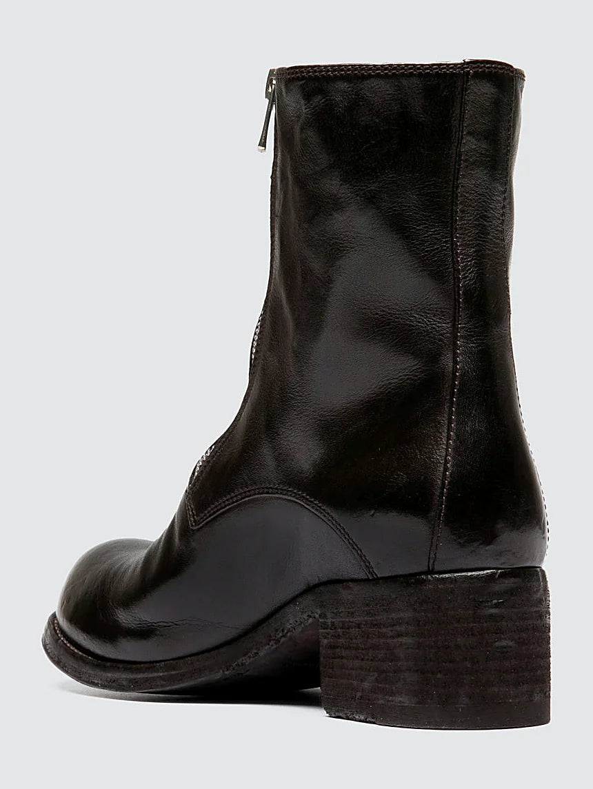 Brown leather sole close view of the fastening