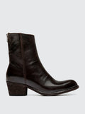 Brown stacked heel close view of the heel and sole edge