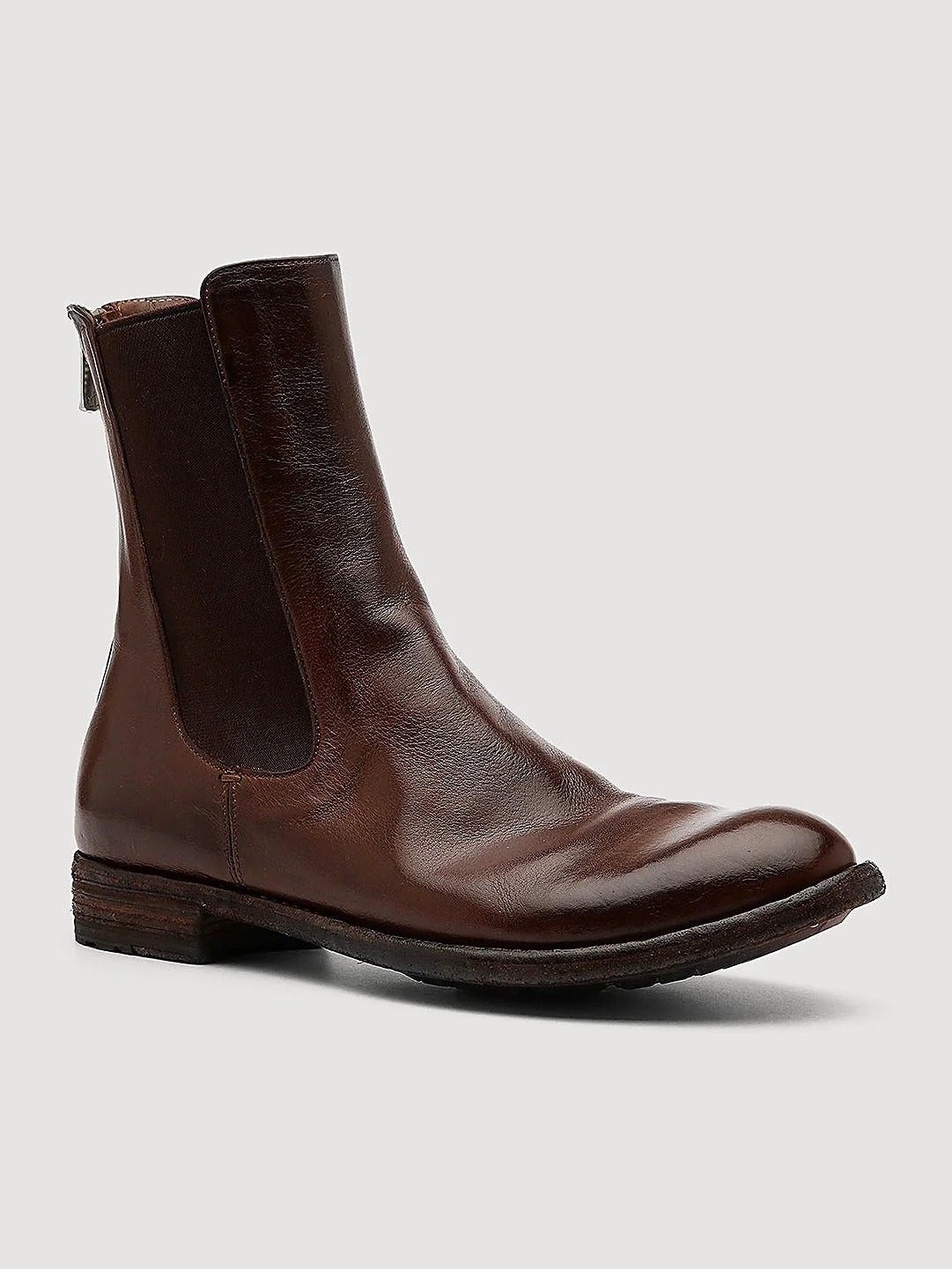 Brown zip entry close view of the heel and sole edge