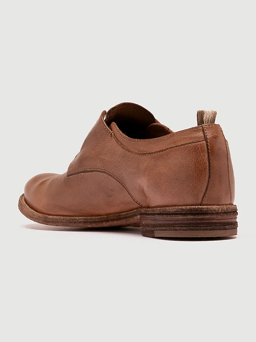 Brown derby lace-ups front view showing the shape of the toe