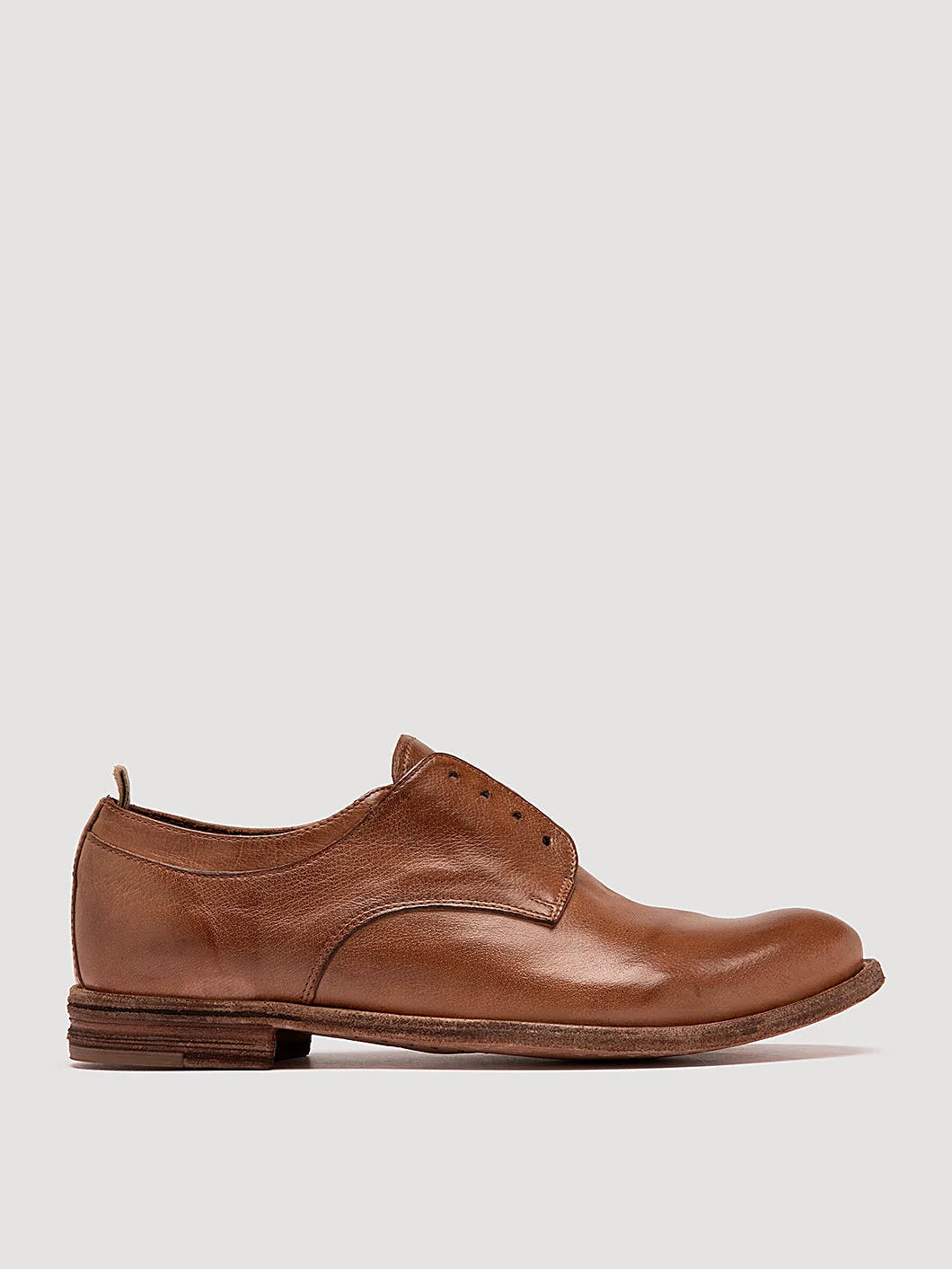 Brown derby lace-ups viewed from above showing the opening