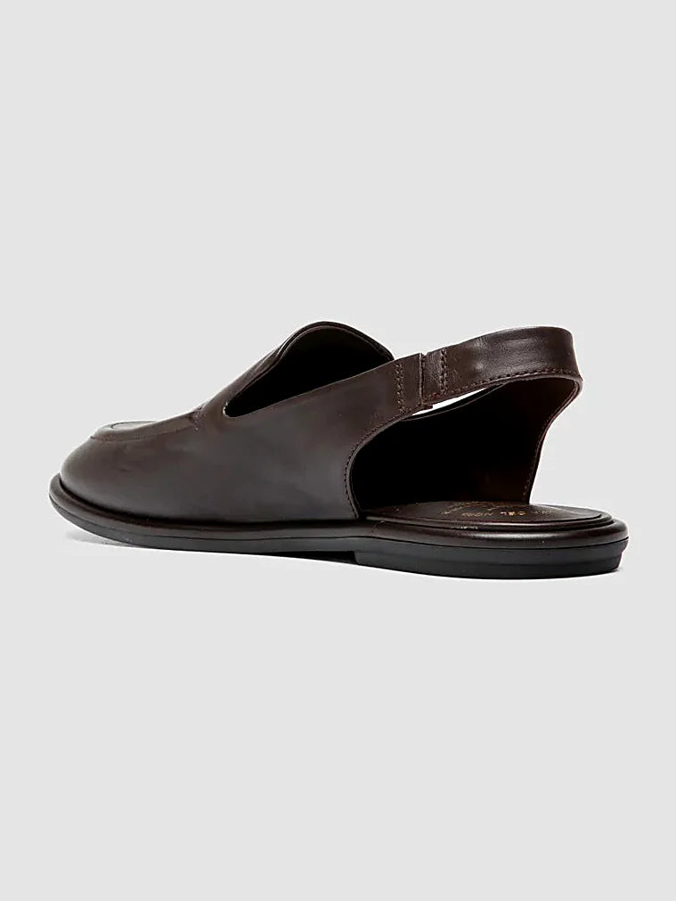 Brown flexible sole pair arranged together on a neutral ground