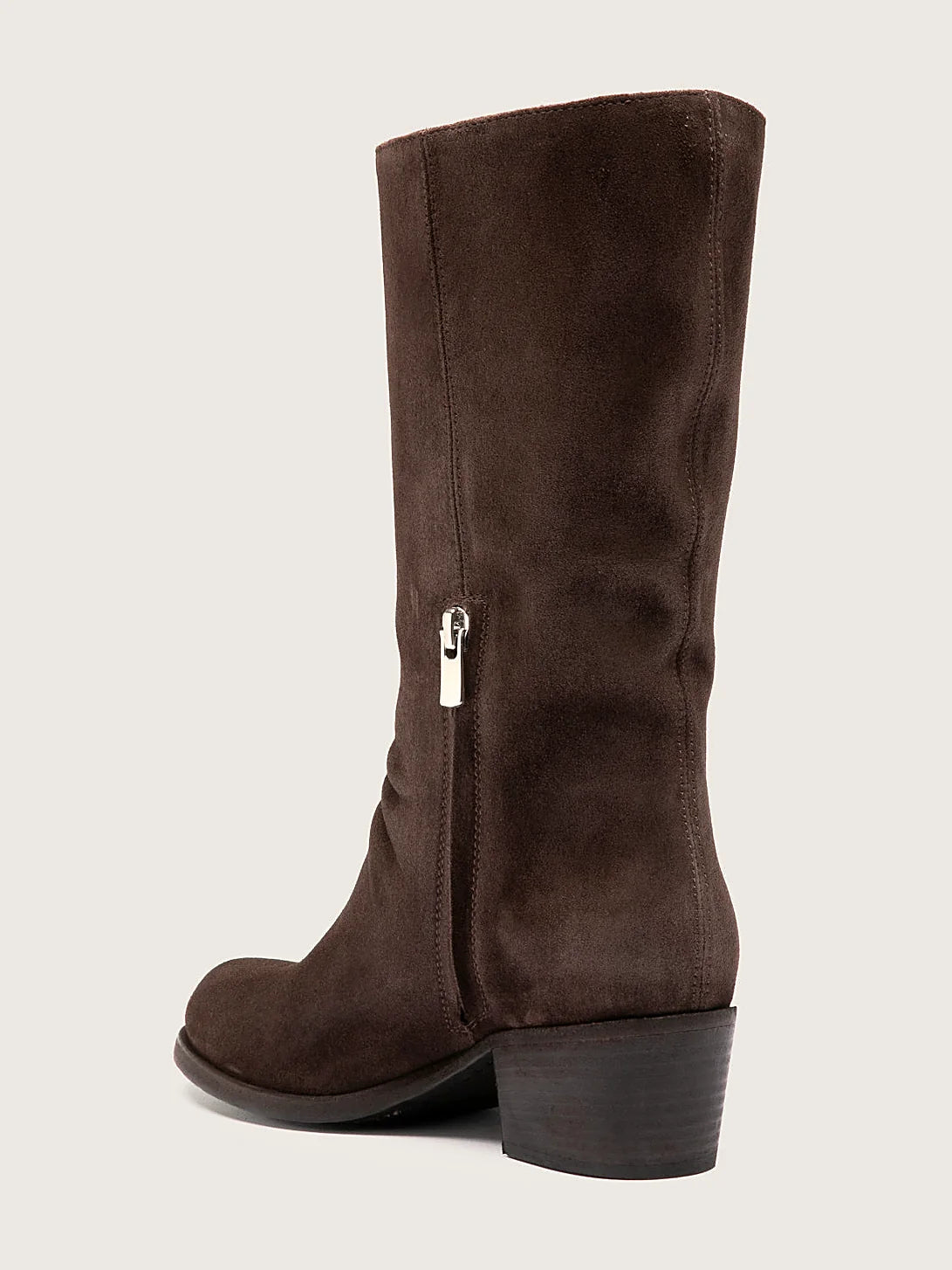 Brown side zip close view of the heel and sole edge