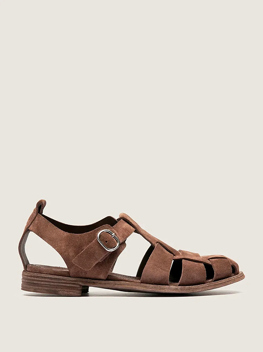 Brown sandals hand-built close view of the fastening