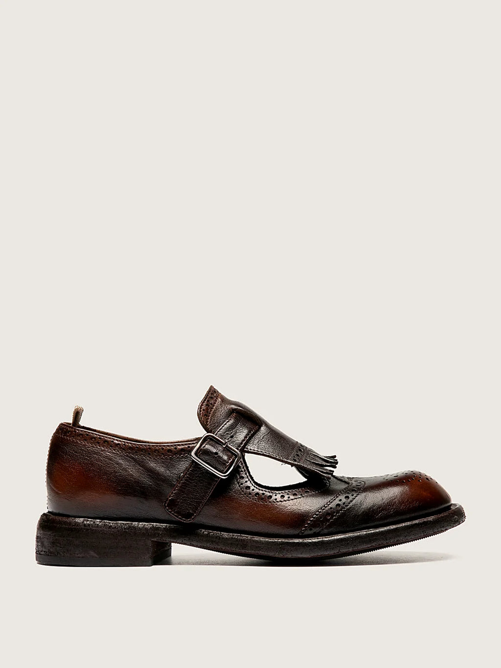 Brown block heel shown from the side on a plain background