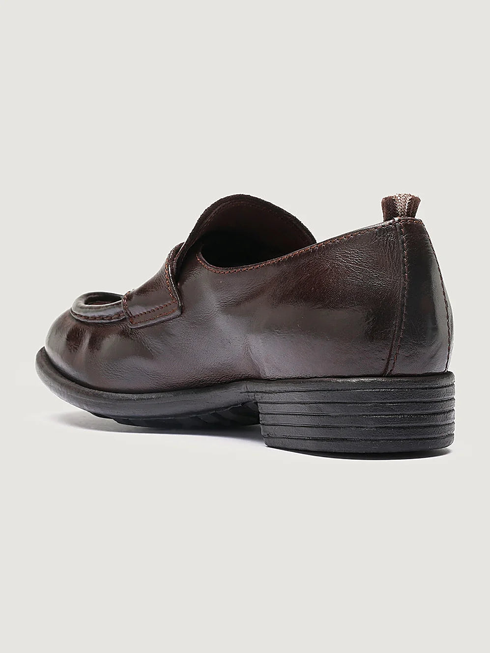 Burgundy rubber sole shown from the side on a plain background