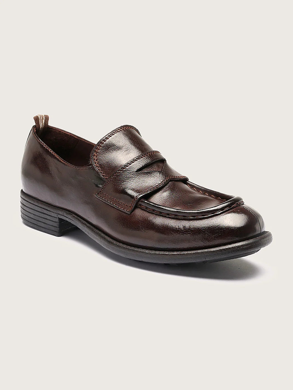 Burgundy rubber sole close view of the fastening