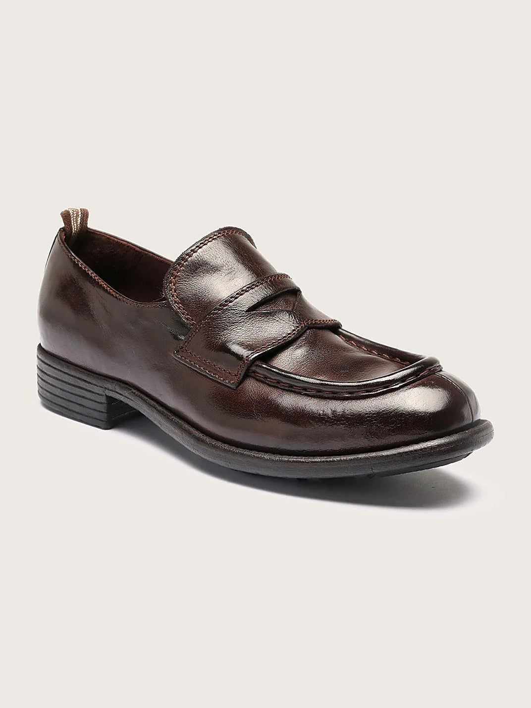 Burgundy rubber sole close view of the fastening