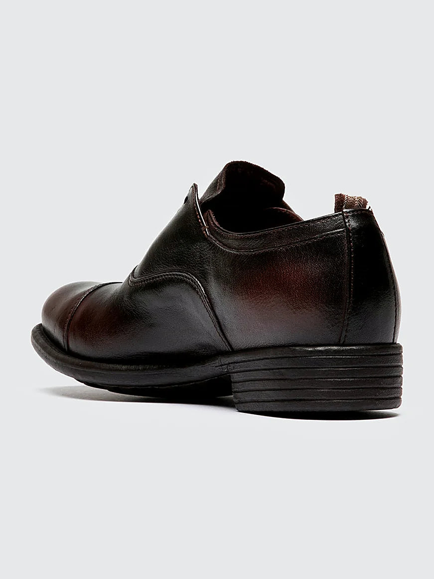Brown oxford shoes close view of the heel and sole edge