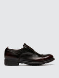 Brown oxford shoes seen at an angle showing the toe
