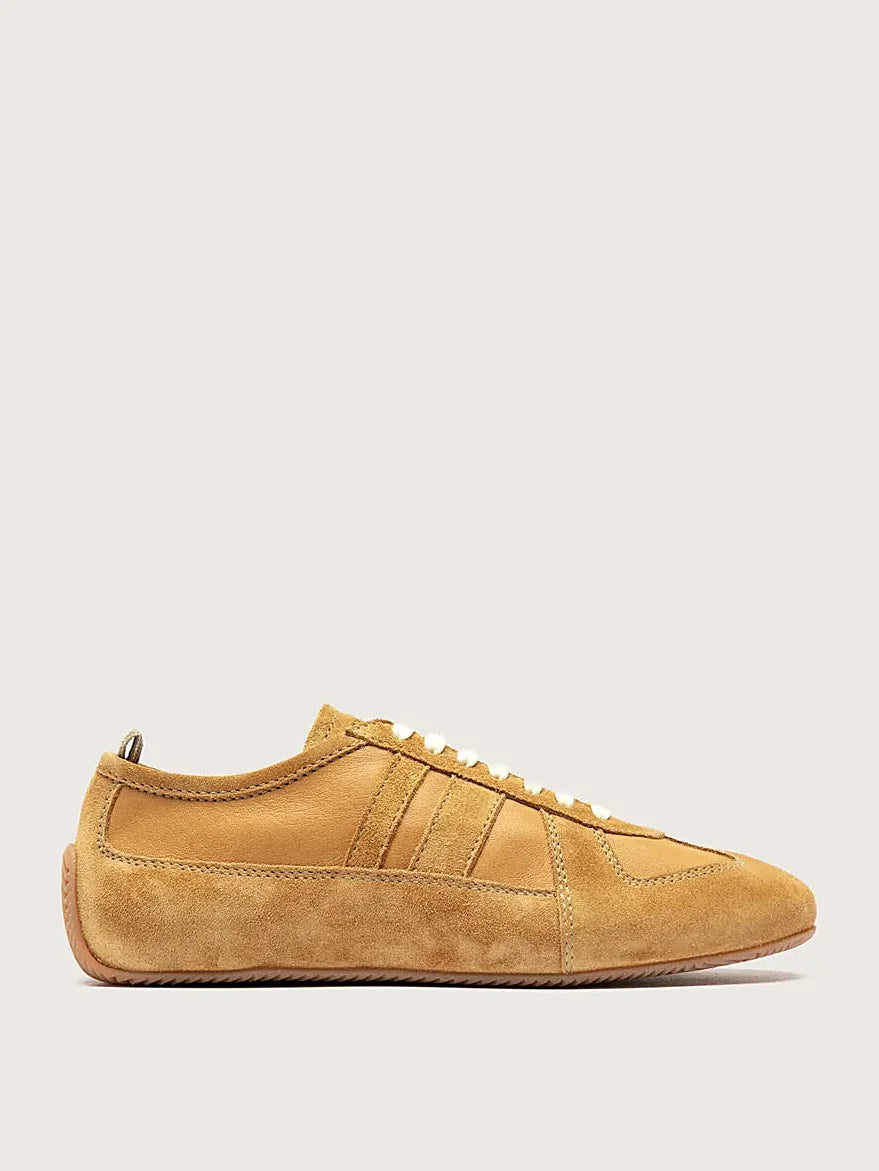 Beige tonal suede viewed from above showing the opening