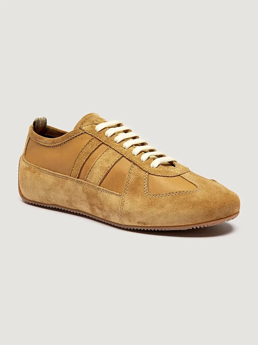 Beige tonal suede close view of the heel and sole edge