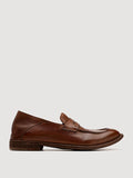 Brown leather loafers shown from the side on a plain background