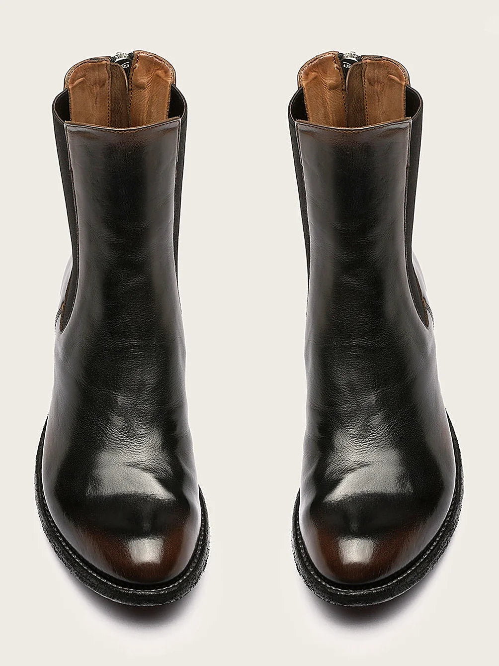 Brown hand-finished leather seen at an angle showing the toe