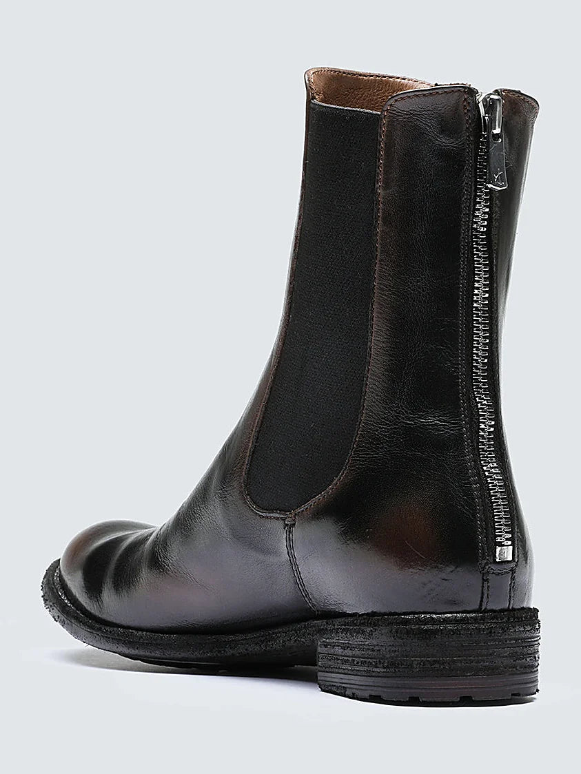 Brown hand-finished leather close view of the heel and sole edge