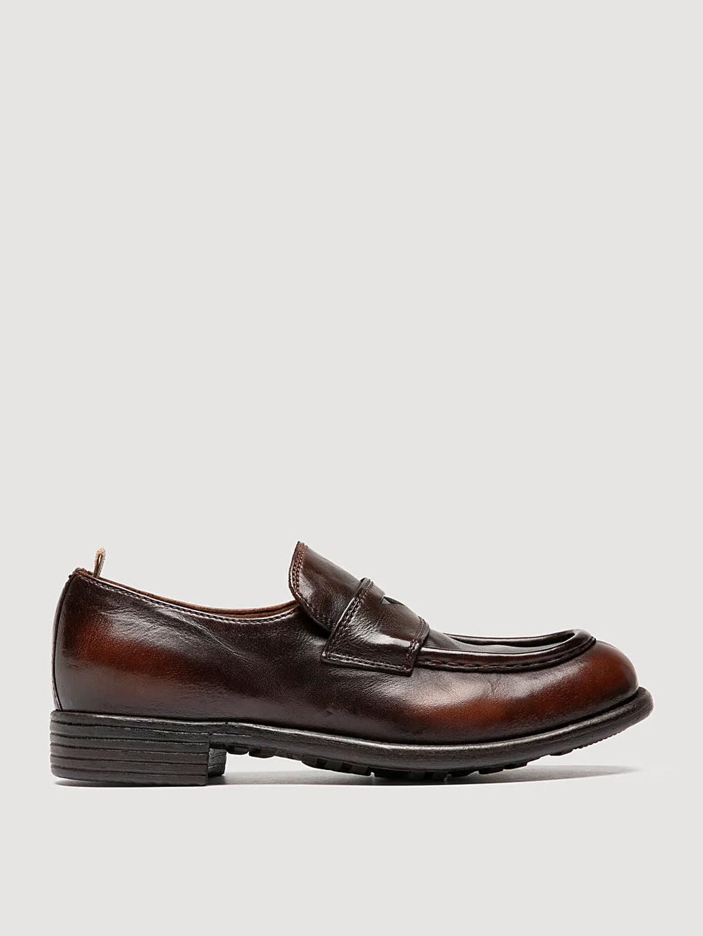 Brown loafers rubber-soled close view of the fastening