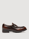 Brown loafers rubber-soled close view of the fastening
