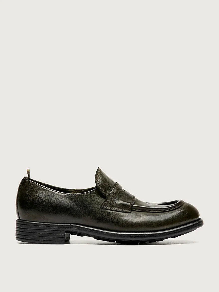 Green leather loafers detail of the stitching and upper