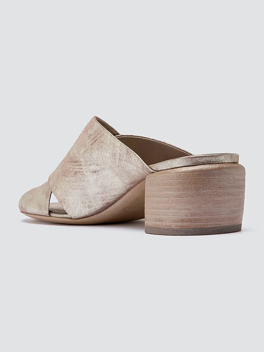 Neutral stacked heel pair arranged together on a neutral ground
