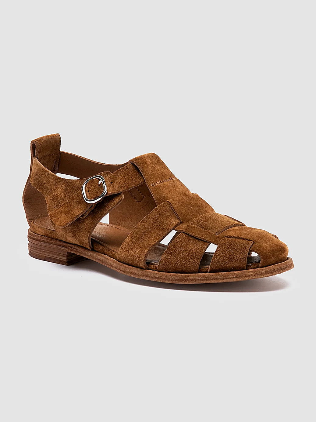 Brown suede sandals close view of the fastening