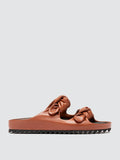 Brown slide sandals close view of the heel and sole edge
