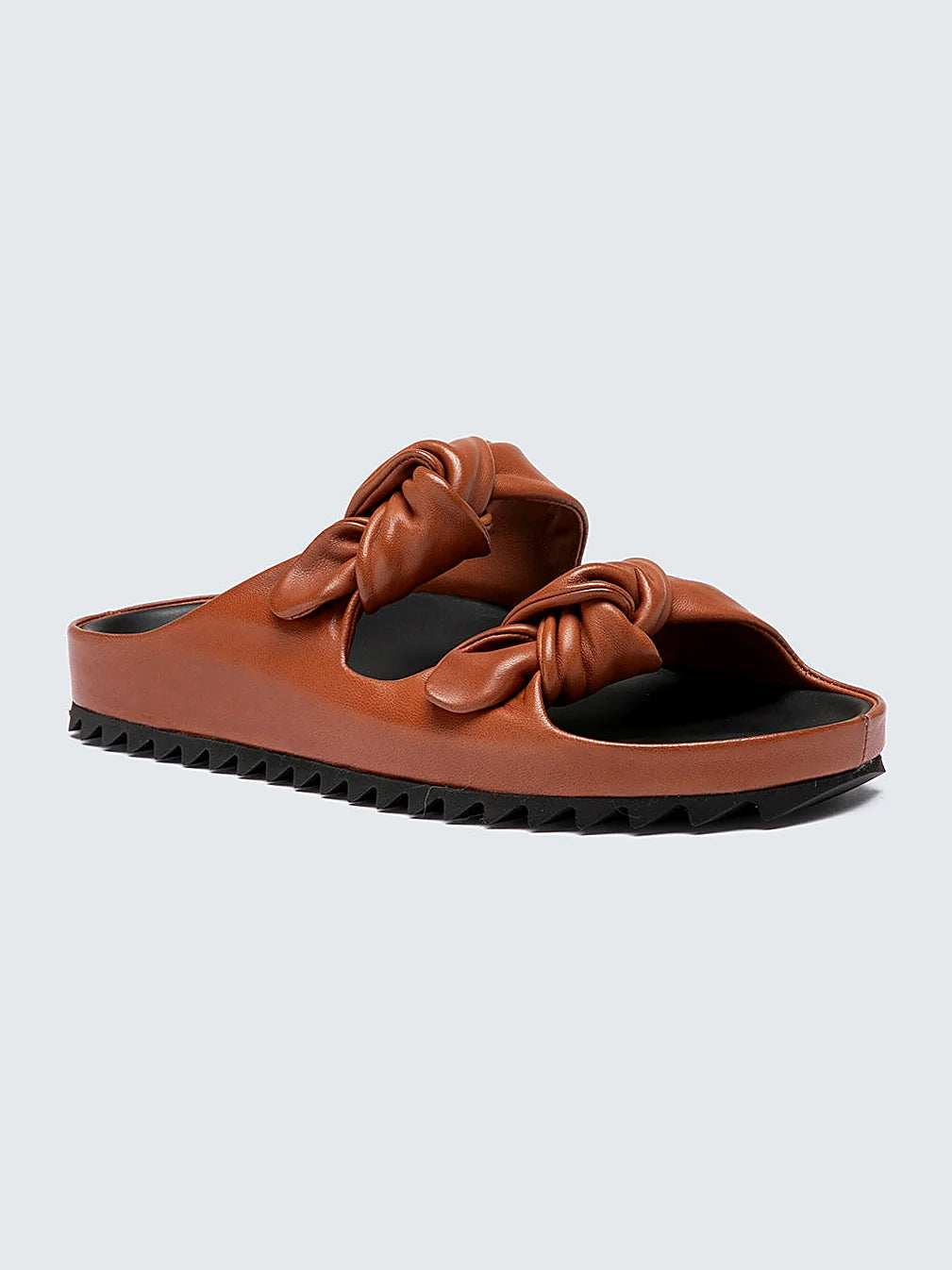 Brown slide sandals front view showing the shape of the toe