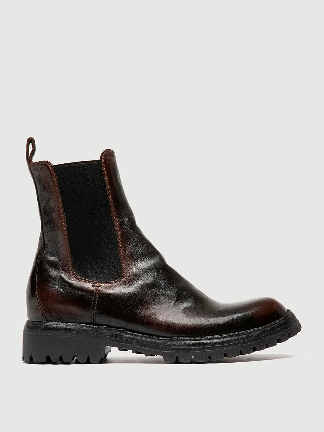 Brown chelsea boots front view showing the shape of the toe