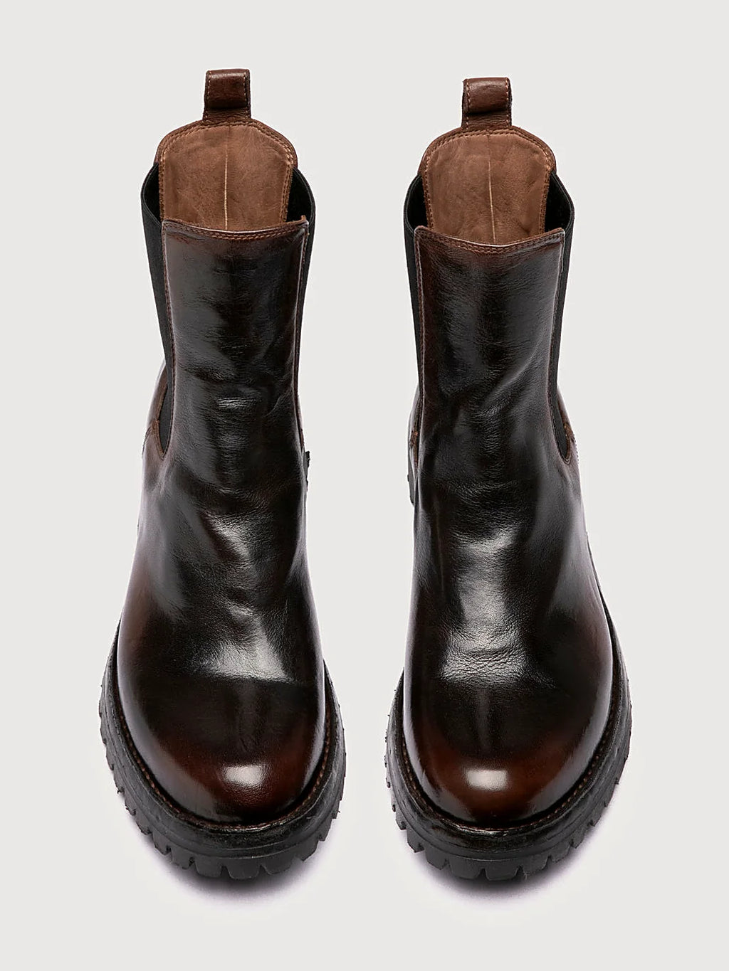 Brown chelsea boots detail of the stitching and upper