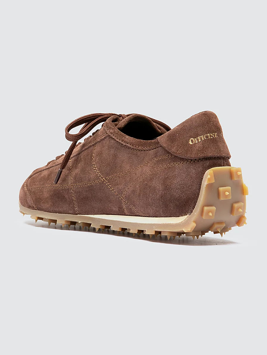 Brown suede sneakers detail of the stitching and upper
