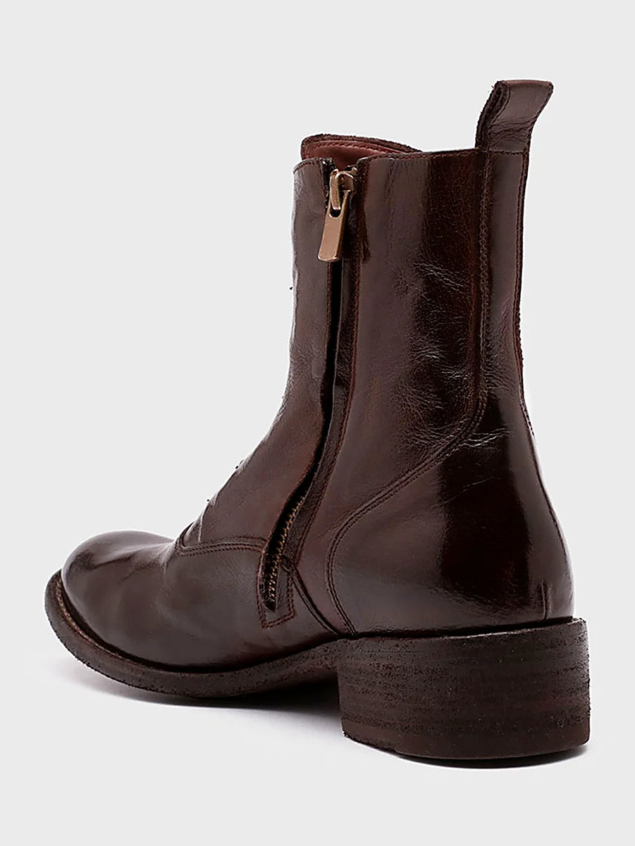 Burgundy burgundy booties pair arranged together on a neutral ground