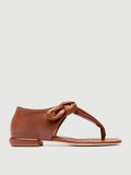 Brown thong sandals detail of the stitching and upper