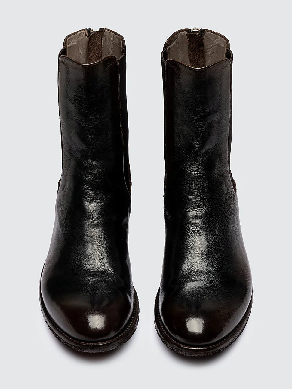 Brown smooth leather shown from the side on a plain background