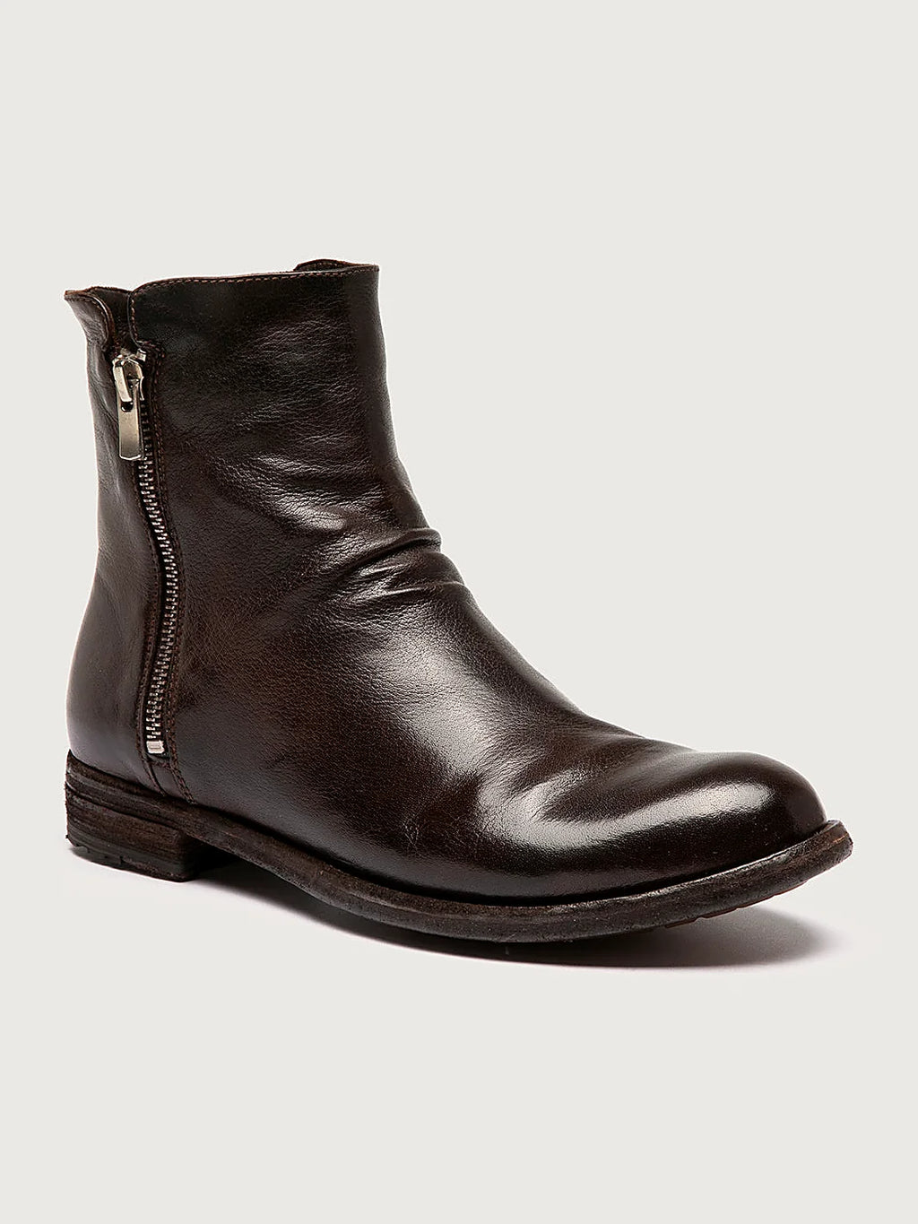 Brown twin zips shown from the side on a plain background