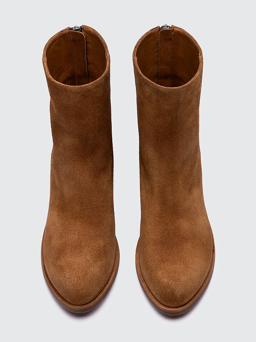 Brown brown suede close view of the heel and sole edge
