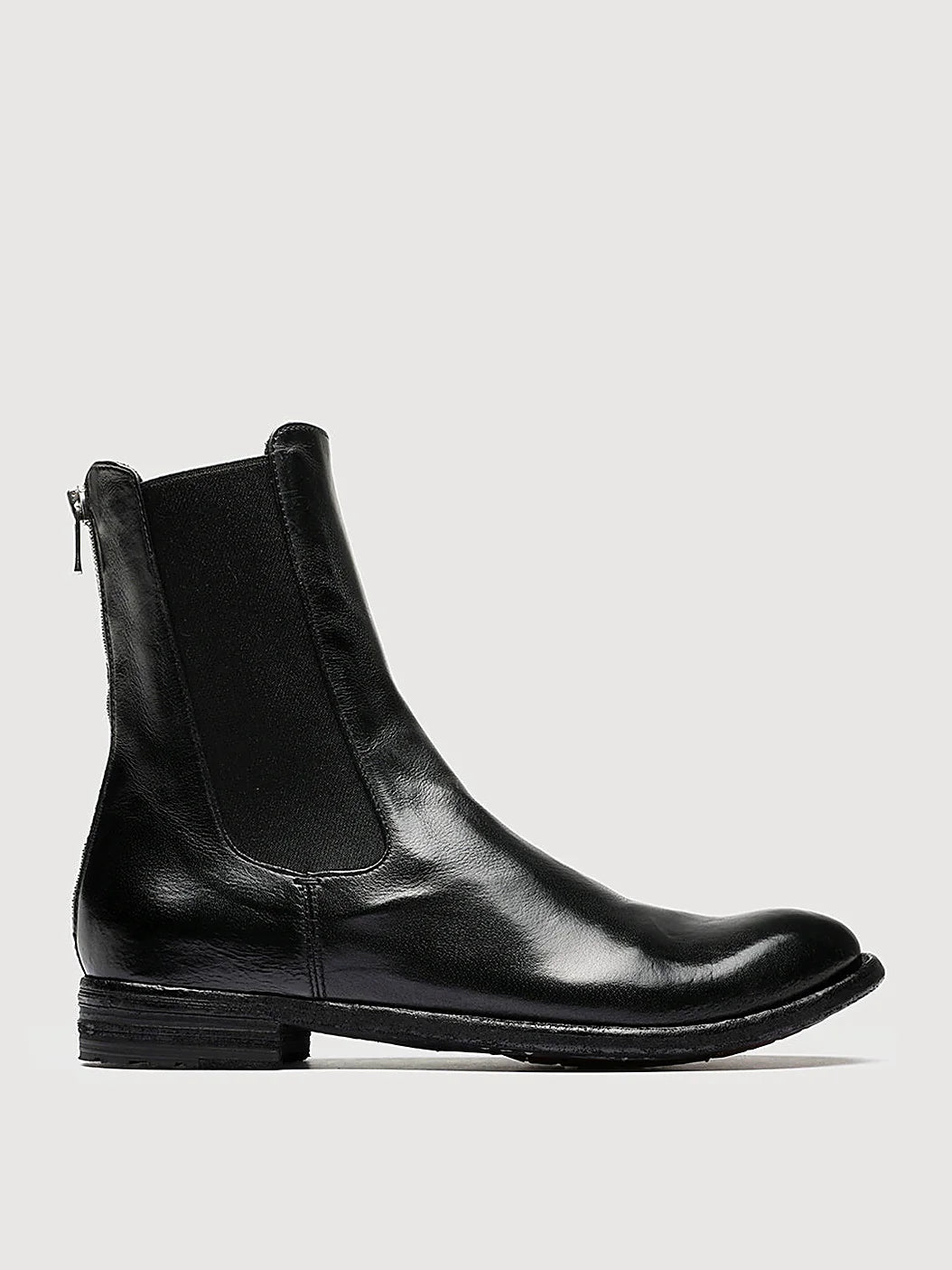 Black zipped heel viewed from above showing the opening