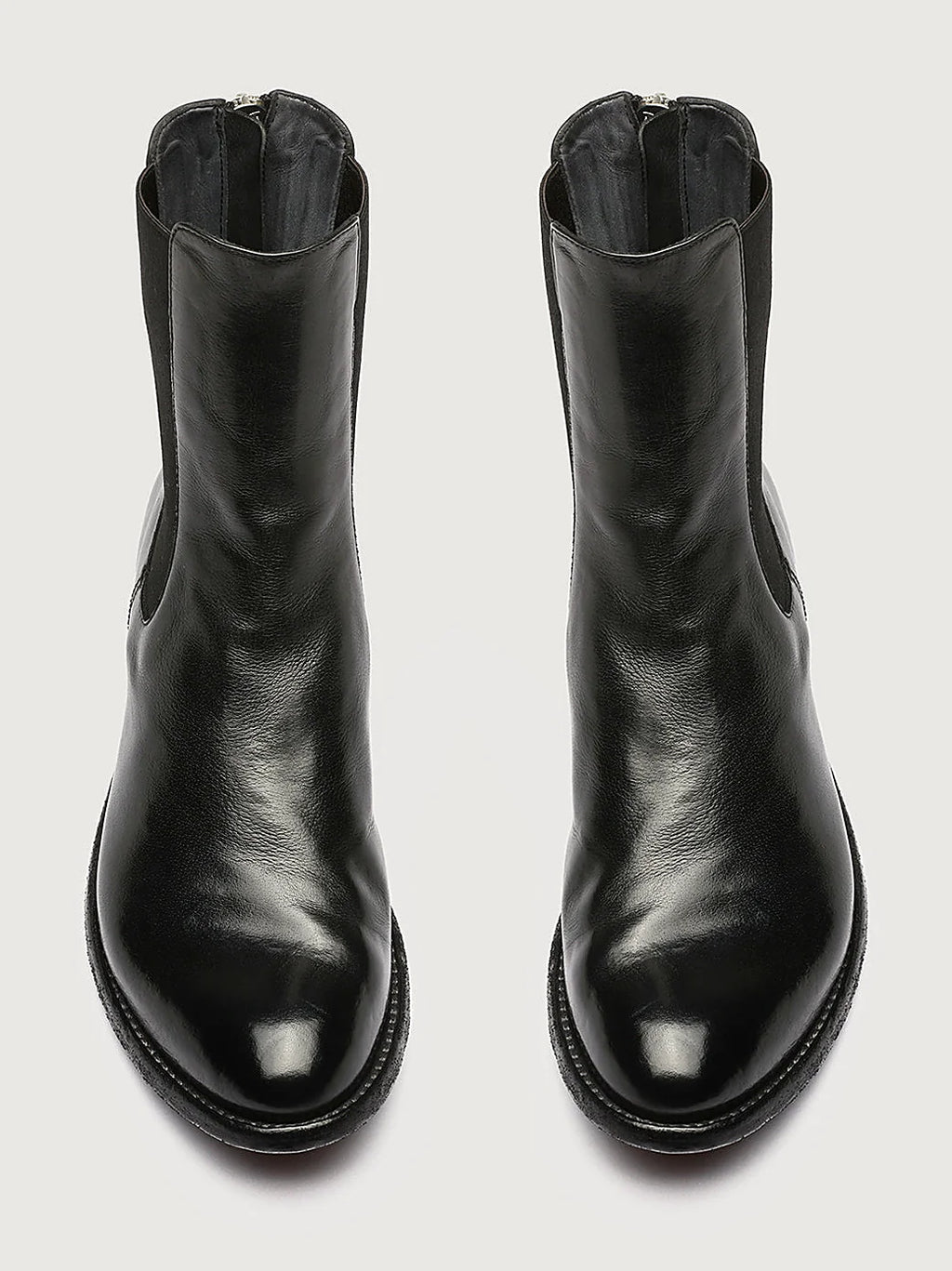 Black zipped heel close view of the heel and sole edge