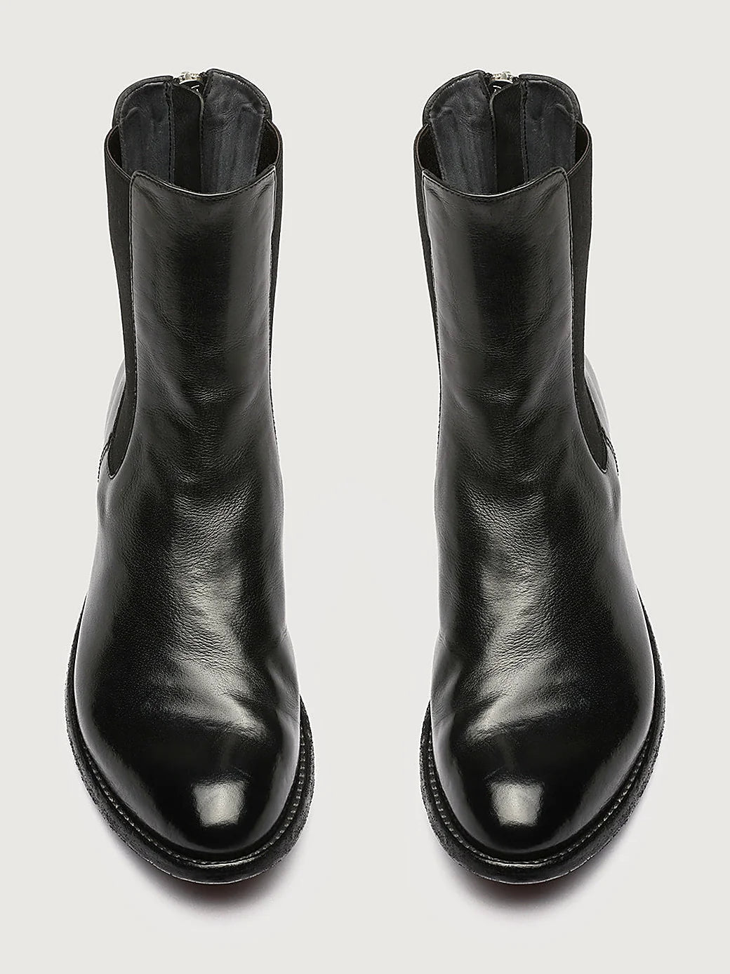 Black zipped heel close view of the heel and sole edge