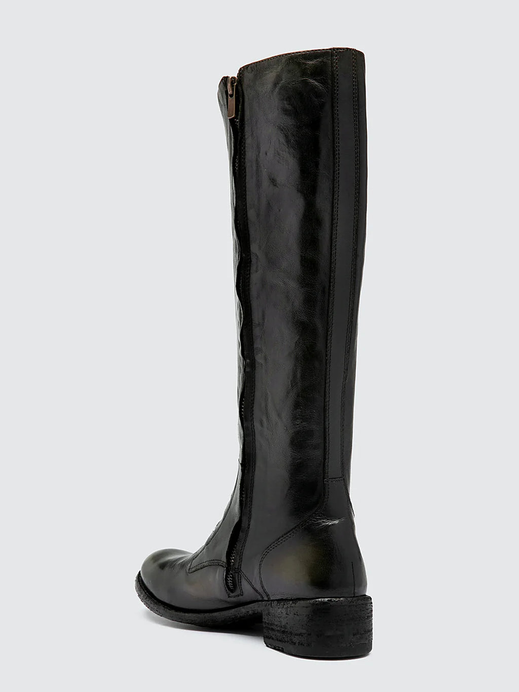 Brown side zip shown from the side on a plain background