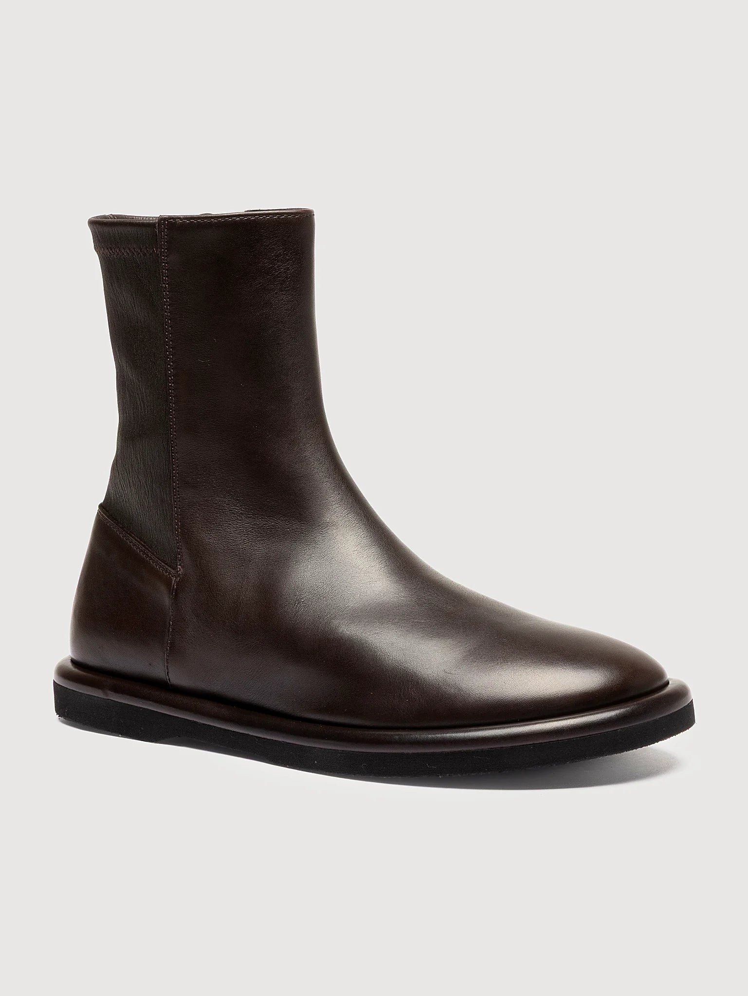 Brown stretch entry close view of the heel and sole edge